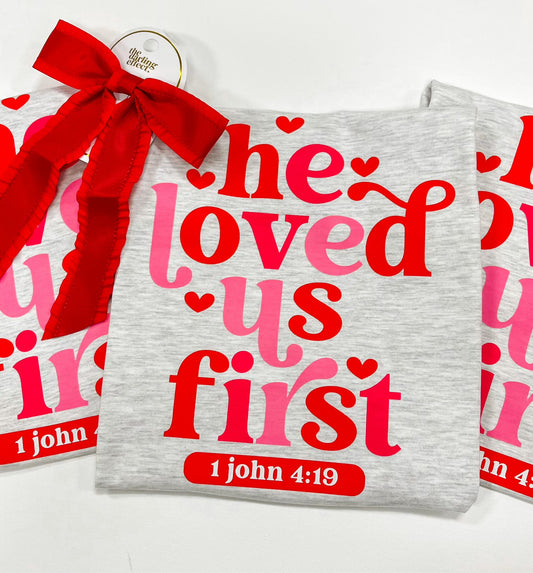 1 John 4:19 Tee